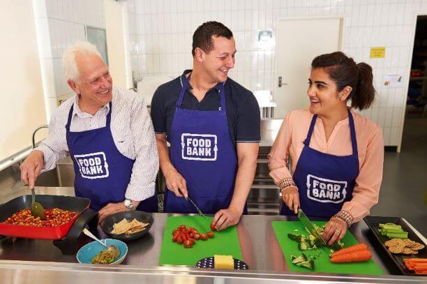 people cooking in kitchen