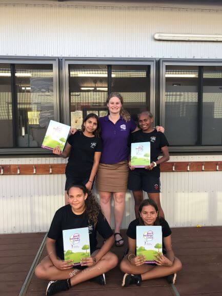 four high school students and teacher